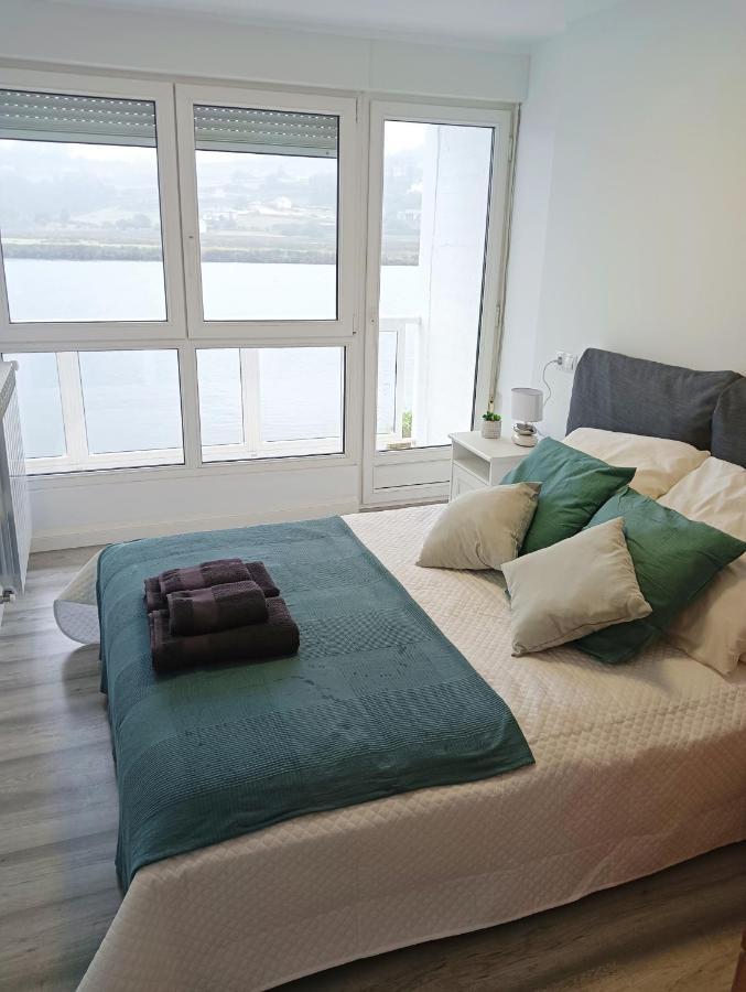 Apartamento Ria Navia Luaran gambar